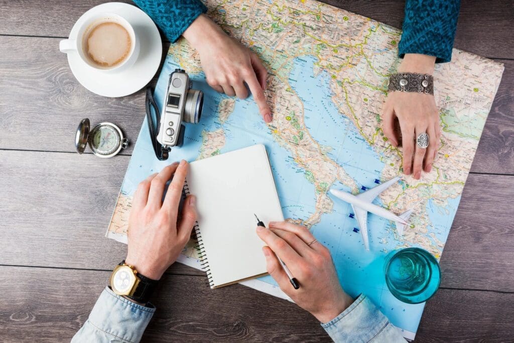 A group of people sitting around a map